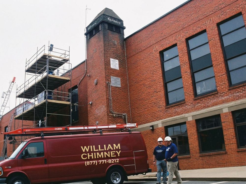 Commercial chimney rebuild with scaffolding
